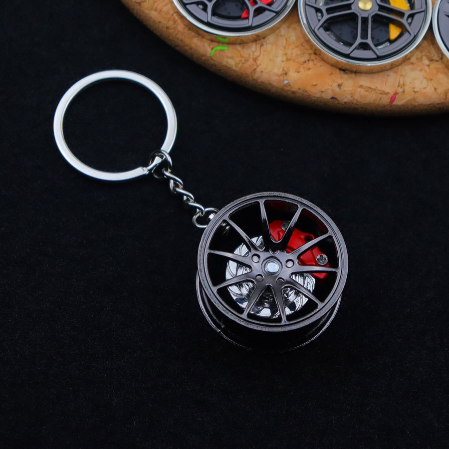 Porte-clés moyeu de roue en mé - Heavy Equipment Keychain avis et prix